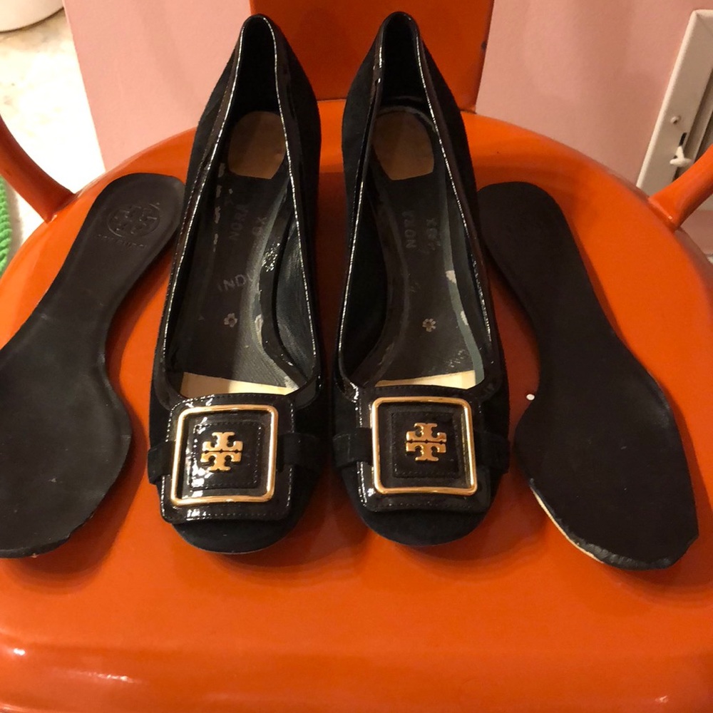 Tory Burch low heeled black suede pumps.